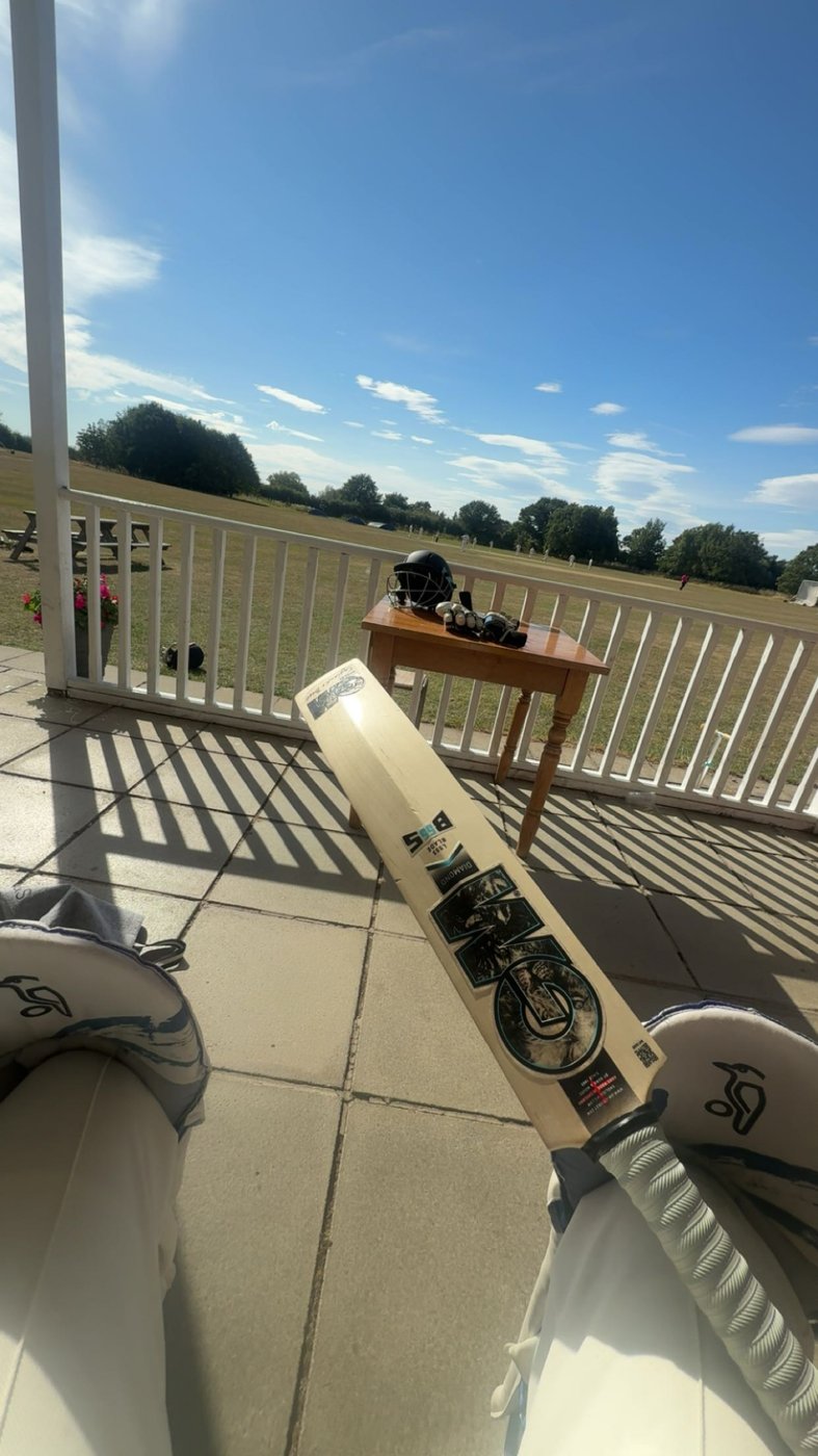 My cricket bat and pads at the pavilion