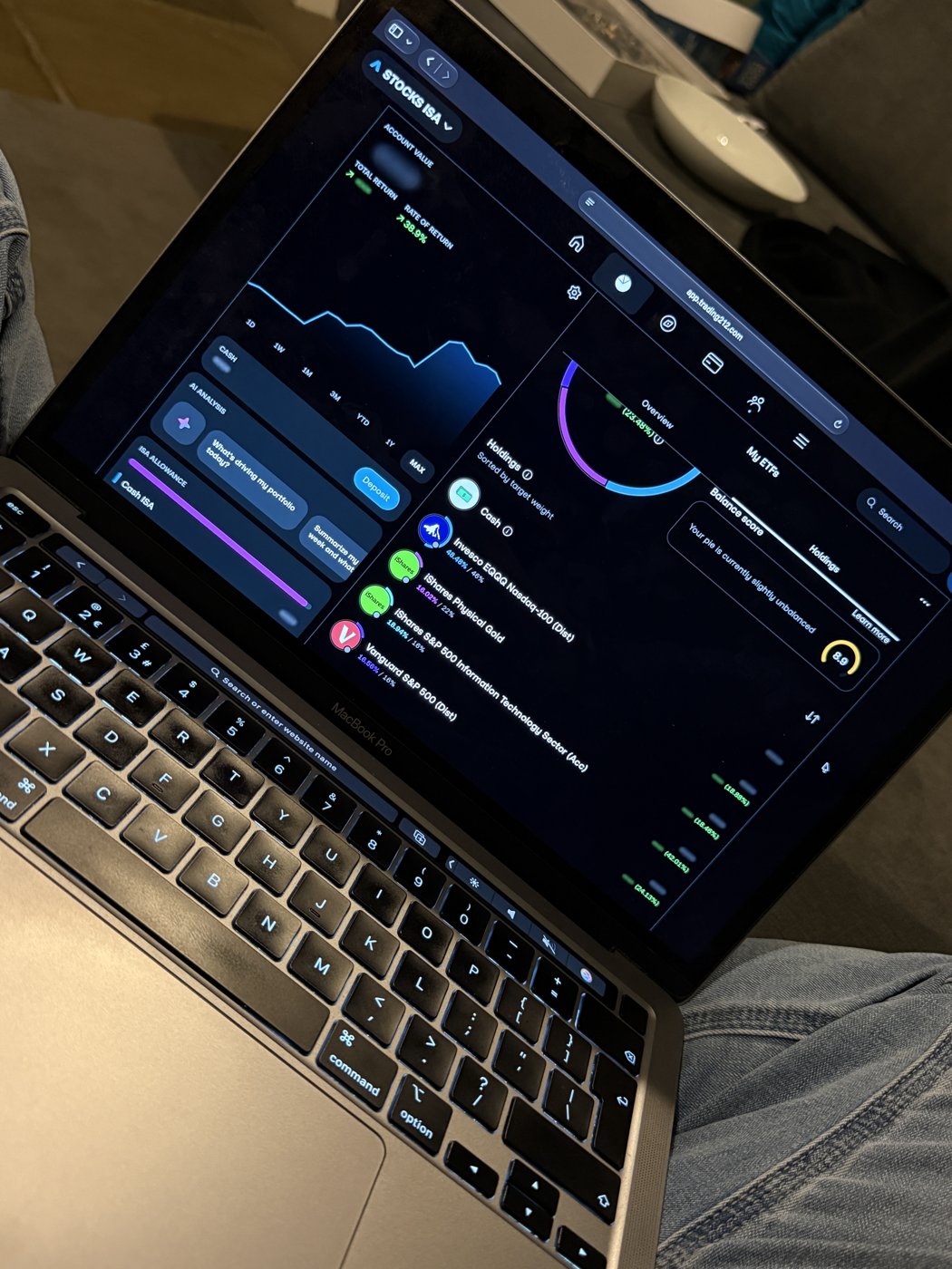 My investing dashboard open on my laptop